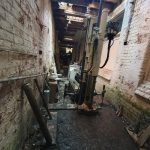 drilling rig gaining tight access for ground investigation